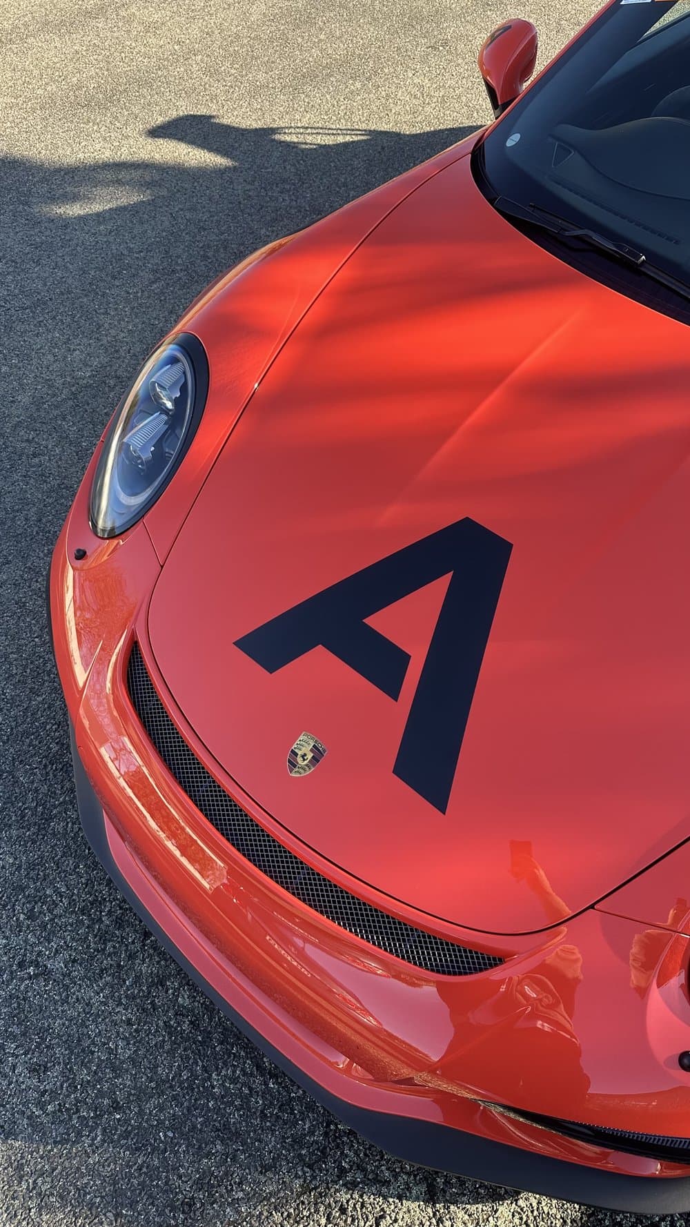 The A emblem on the bonnet of The Advisry race car